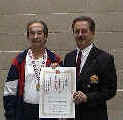 Ken Desjardins receiving 3rd dan certificate with Sensei Moledzki.