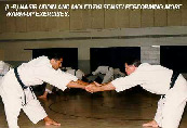 (L-R): Nasir Uddin & Moledzki sensei performing more warm-up exercises.