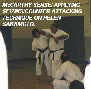 McCarthy sensei applying seizing/counter attacking technique on Helen Sakamoto.