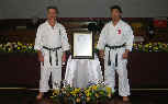 (l-r): Moledzki sensei, portrait of late great Shitokai Karate master Iwata Manzo, Iwata Genzo sensei (Chief director of WSKF Technical Committee & Chief instructor WSKF Japan Headquarters Dojo).