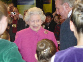 Her Majesty Queen Elizabeth II seems to share a humorous moment with the Premier of Ontario, Ernie Eves.