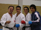 (L-R): Sensei Sam Moledzki (President of Karate Ontario); Mohamed Fizali (Canadian National Silver medalist and 2002 Pan American Karate Federation Bronze medalist); Ehsan Debaji (Canadian National Bronze medalist and 2002 Pan American Karate Federation Bronze medalist in his weight catagory); and Saeed Baghbani (2002 Canadian National Gold Medal Champion and 2002 Pan American Karate Federation Gold medalist black belt champion).