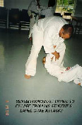 Sensei Pronovost trying to escape from his student's lapel grab attack?