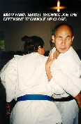 Murayama sensei showing Joe the defensive technique up-close.