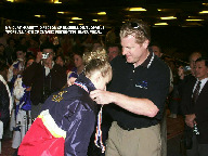 Curt Harnett presenting silver medal.